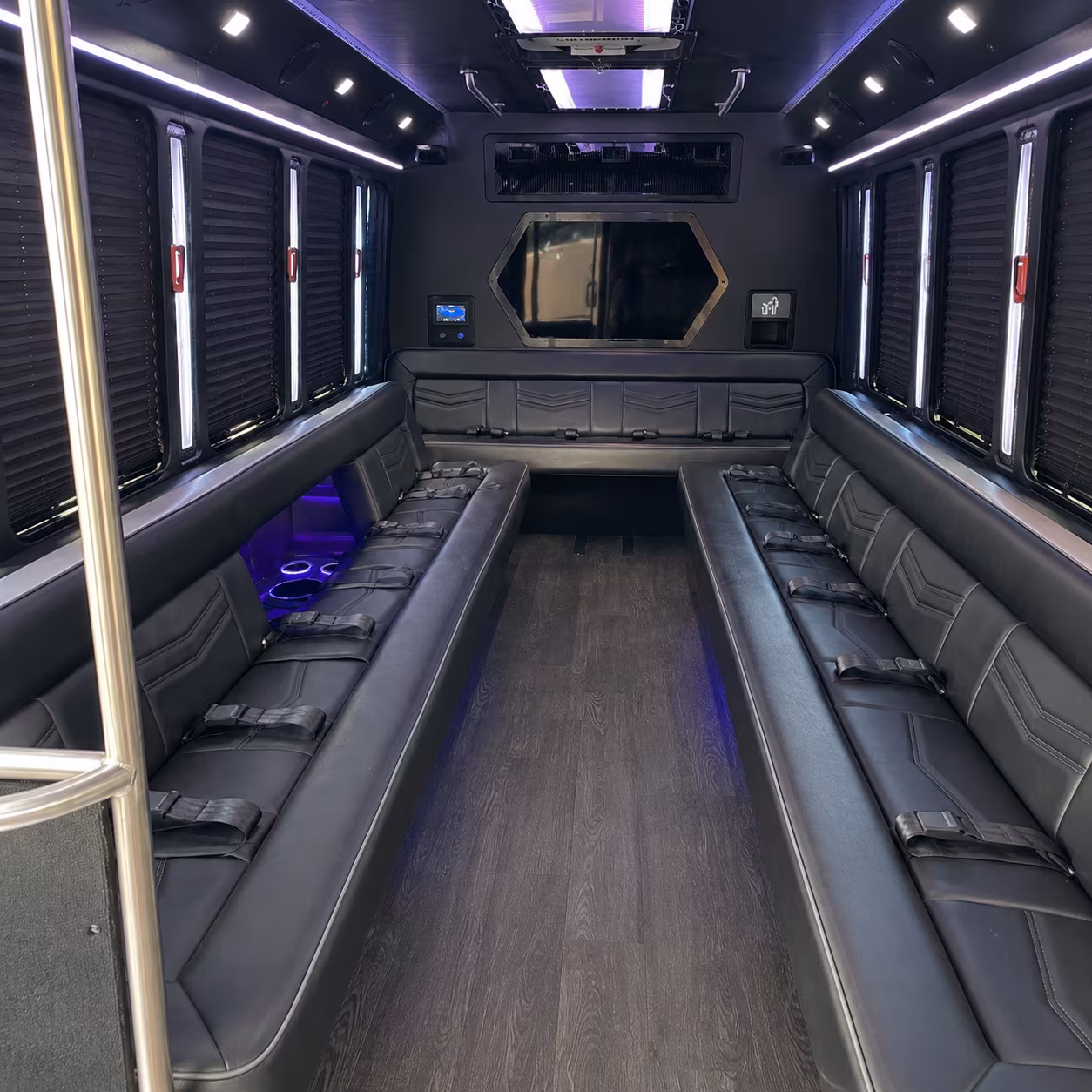 Group beside a Mercedes Sprinter limo in Pittsburgh