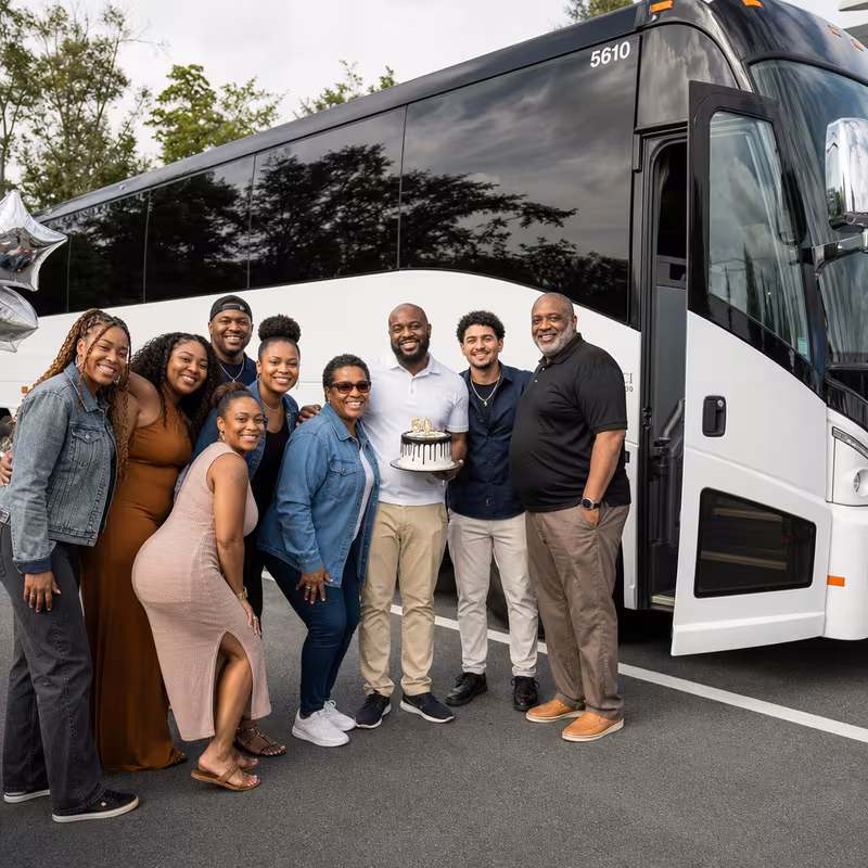 Passengers loading luggage while boarding an Pittsburgh group shuttle