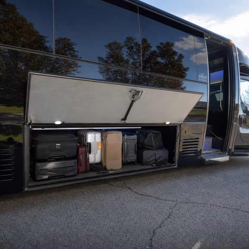Party bus interior with wraparound leather seating and LED lighting in Pittsburgh